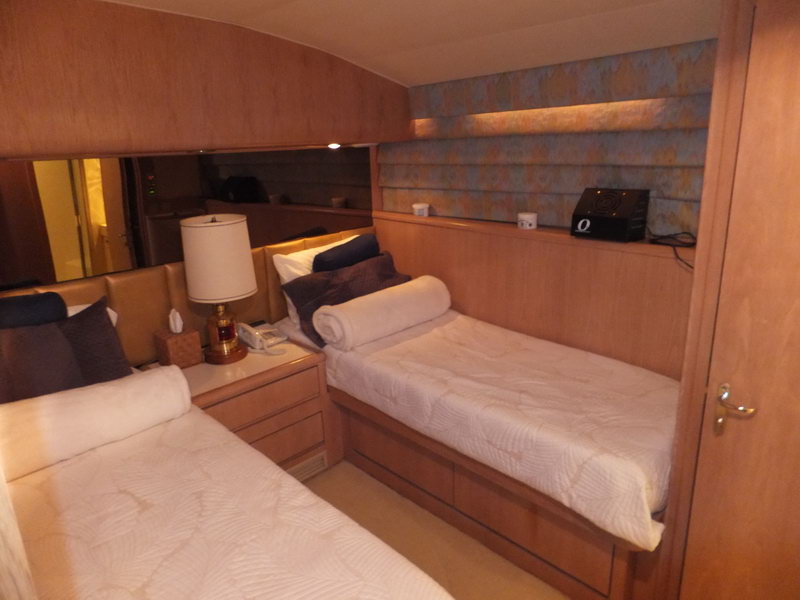 Hatteras 66 ft deep-sea fishing charter yacht at Caribbean marina, long-range overnight fishing trips Cozumel Sian Kaan