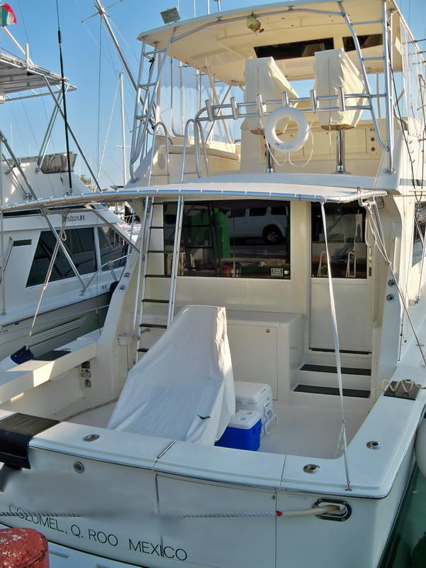 Anglers aboard the Bertram 38 trolling the deep blue water off Cozumel Island for billfish