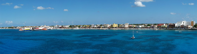 Panoramic view of San Miguel de Cozumel waterfront from the turquoise Caribbean, gateway to the island's dive sites