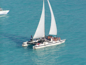 Aerial stern view catamaran MAR sailing Caribbean Cancun Isla Mujeres private family charter vacation