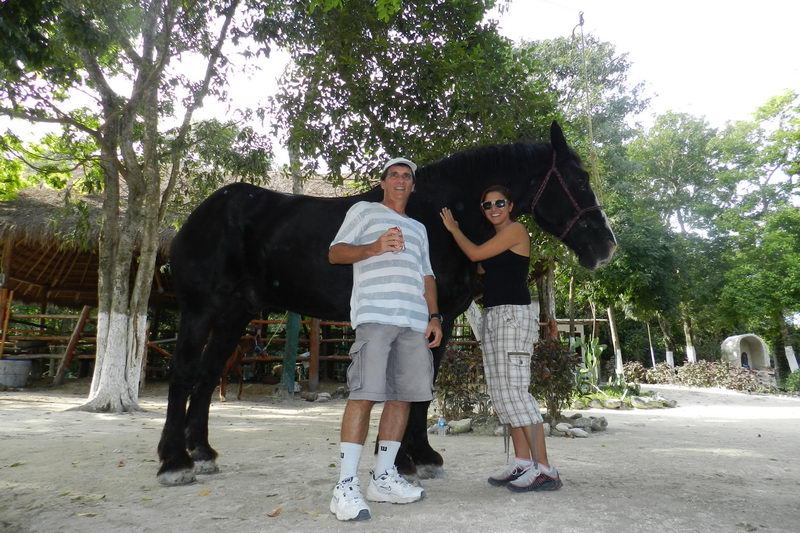 Small group horseback ride following the shoreline at Maroma Beach