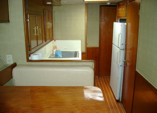 Hatteras 48 Querida del Mar galley kitchen with A/C sub-zero fridges overnight fishing charter
