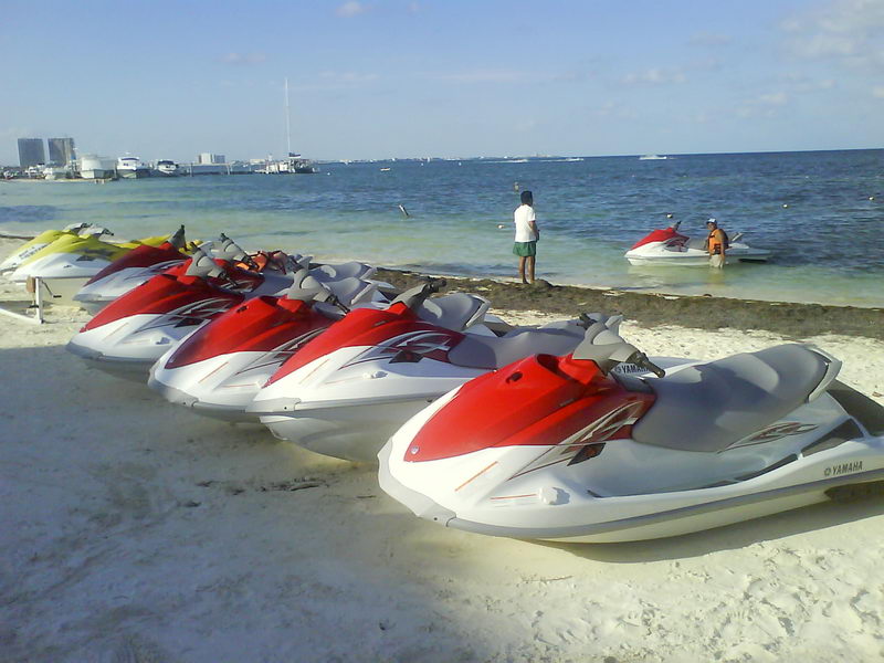 Waverunner ready to rent on the Cancun shoreline, a powerful personal watercraft for fun on the Caribbean